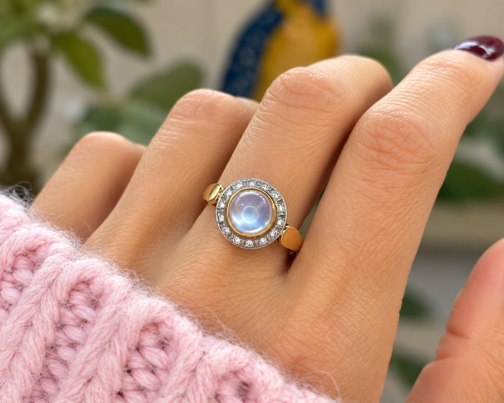 vintage 18ct moonstone and diamond halo ring for sale in Leeds on hand
