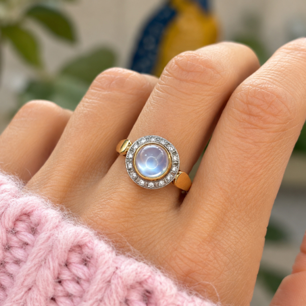 vintage 18ct moonstone and diamond halo ring for sale in Leeds on hand