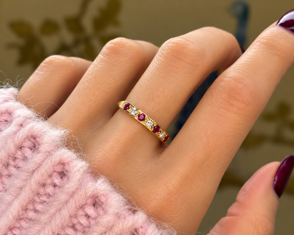 vintage ruby and diamond half eternity ring in 18ct yellow gold for sale in Leeds on a hand