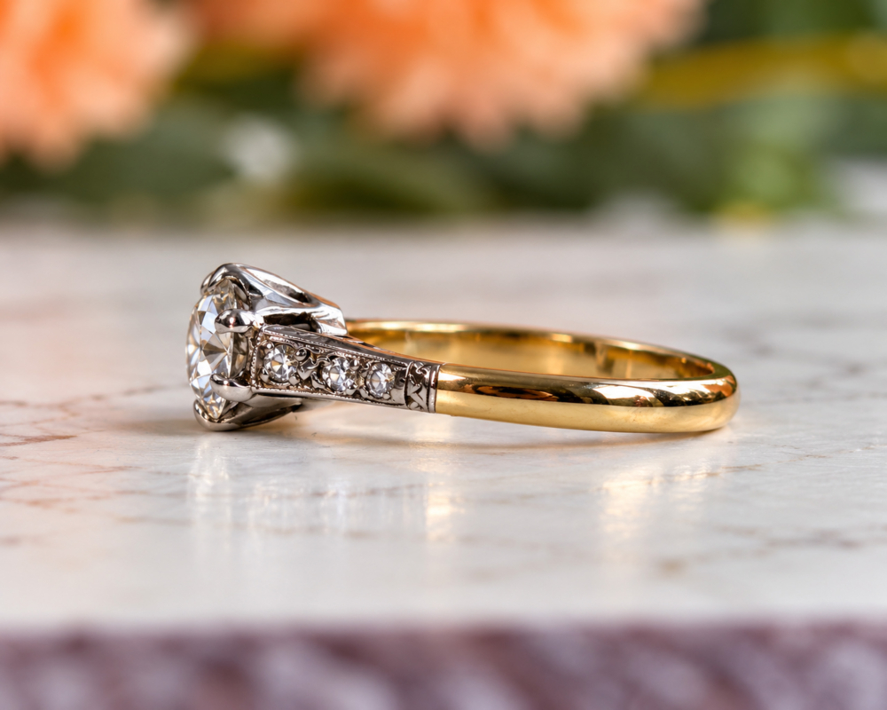 antique Art Deco diamond solitaire with diamond shoulders in 18ct yellow gold and platinum 0.7ct for sale in Leeds, showing side profile of the ring