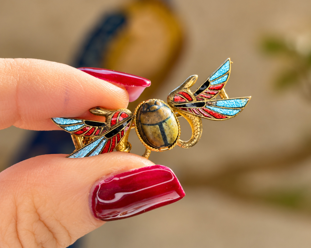 antique Egyptian Revival brooch in gilt and enamel for sale in Leeds