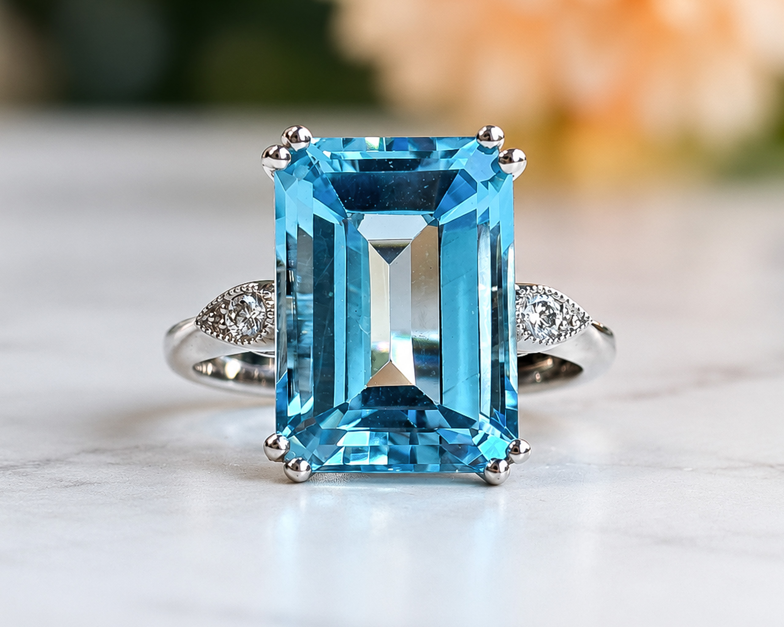 art deco style blue topaz and diamond ring in 9ct white gold