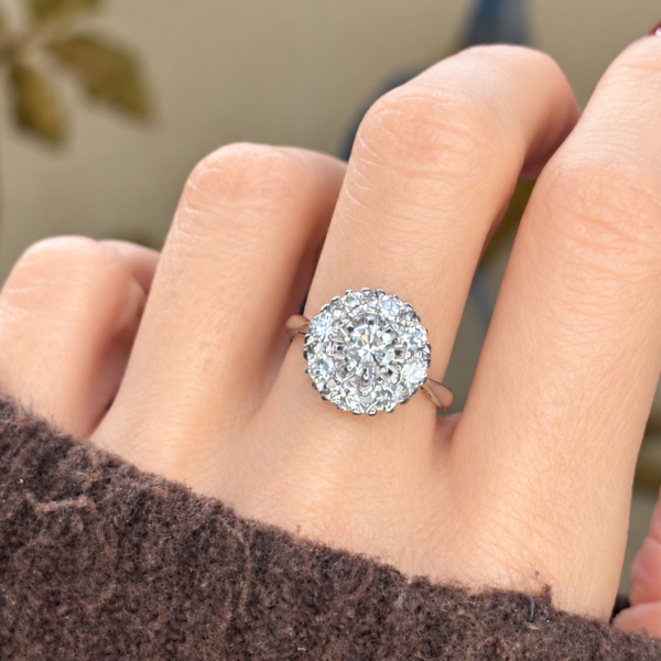vintage 1940s diamond cluster ring 1ct 18ct white gold for sale in Leeds shown on a woman's hand